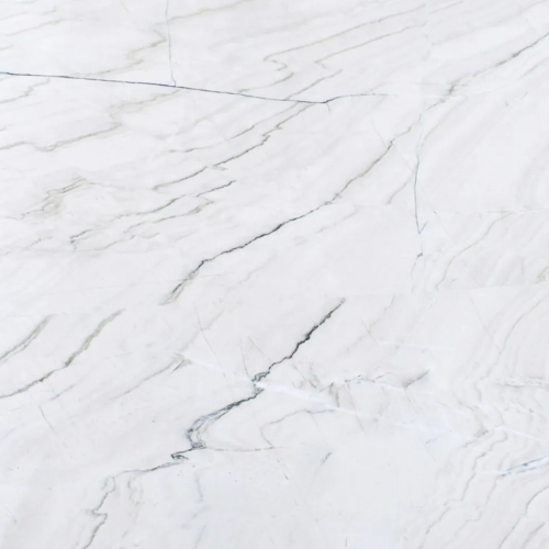 Natural and man-made stone sample of quartzite named White Luxe.